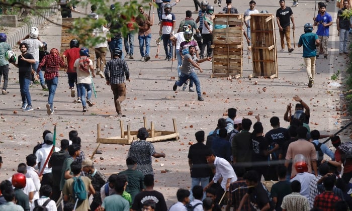 Bangladesh Chhatra League, the student wing of the ruling party Bangladesh Awami League, and anti-quota protesters engage in a clash at the Dhaka College area, in Dhaka, Bangladesh, on July 16, 2024. —Reuters