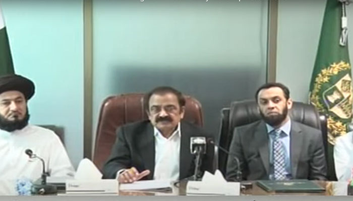 PMs Adviser on Political Affairs Rana Sanaullah (centre) flanked by Information Minister Ataullah Tarar (right) and a TLP leader is addressing the press conference in Islamabad on July 19, 2024. — Screengrab/YouTube/GeoNews