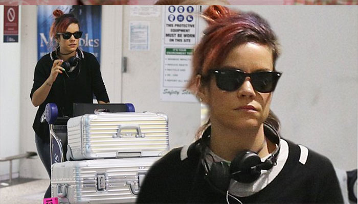 Lily Allen misses flight home due to Heathrow delays.