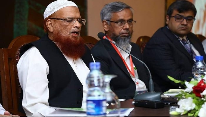 In this file photo, Mufti Muhammad Taqi Usmani (Left) is speaking at conference organised by Pakistan Islamic Medical Association at a local hotel in Karachi on Oct 21, 2018. —Jamia Dar-ul-uloom Karachi