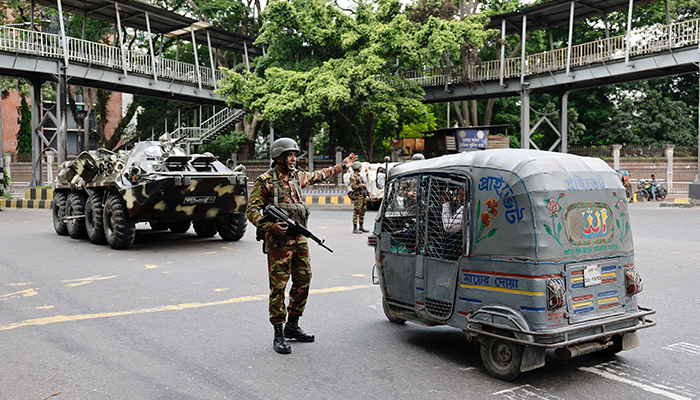 Members of the Bangladesh Army are seen on duty on the second day of curfew, as violence erupted in parts of the country after protests by students against government job quotas, in Dhaka, Bangladesh, July 21, 2024. — Reuters