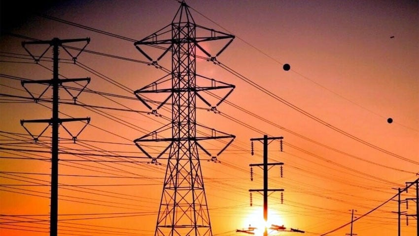 Power pylons are silhouetted against sunset in this undated picture. — Radio Pakistan