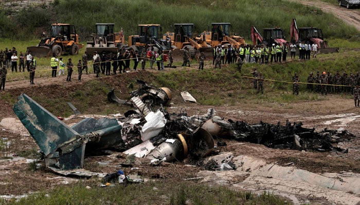 A view shows wreckage of a Saurya Airlines plane that caught fire after skidding off the runway while taking off at Tribhuvan International Airport, in Kathmandu, Nepal, on July 24, 2024. — Reuters