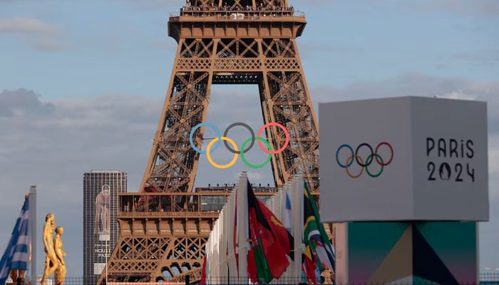 Olympic rings are displayed at the Eiffel Tower ahead of the event in Paris, France on July 22, 2024. — Reuters