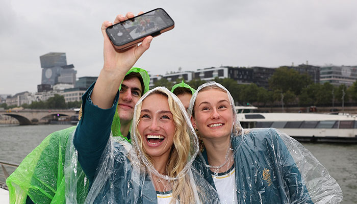 Athletes of Team Australia take a selfie on a boat on the River Seine during the opening ceremony of the Olympic Games Paris 2024. — Reuters