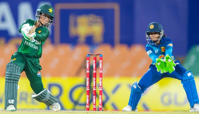 Muneeba Ali of Pakistan smashes the ball as Sri Lankas wicketkeeper-batter Anushka Sanjeewani keeps the wickets during the second semi-final of the Womens T20 Asia Cup at the Rangiri Dambulla International Stadium, Dambulla, Sri Lanka on June 26, 2024. — ACC