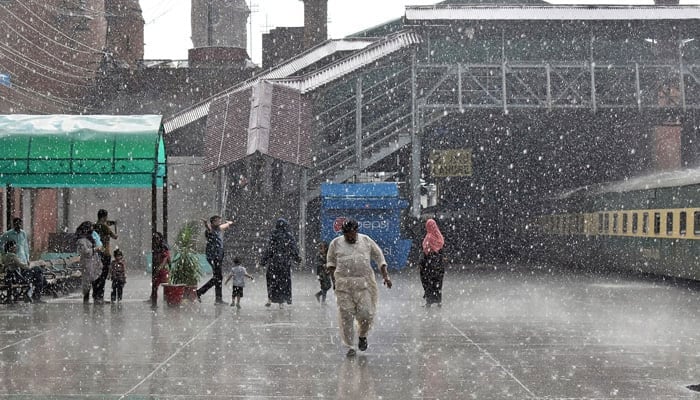 A view of heavy rainfall at the Lahore railway station on August 1, 2023. — Online