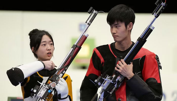 Gold medallists Yuting Huang of China (left) and Lihao Sheng of China at the Paris Olympics, Paris, France on July 27, 2024. — Reuters