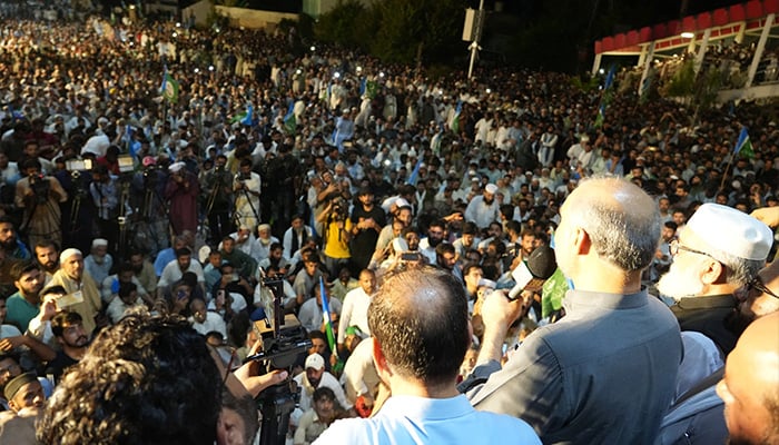 JI workers listen to partys Emir Hafiz Naeemur Rehmans address during the sit-in in Rawalpindi on July 26 2024. — Facebook/Jamaat-e-Islami Pakistan