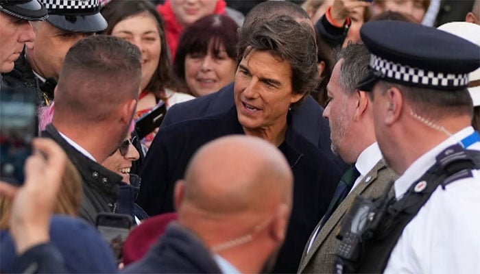 Tom Cruise welcomed by fans at womens gymnastics qualifications during 2024 Paris Olympics.