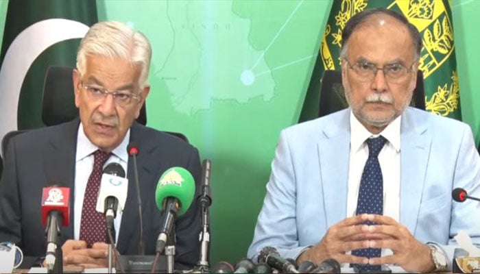 Defence Minister Khawaja Asif (left) and Minister for Planning and Development Ahsan Iqbal address a press conference in Islamabad on July 29, 2024. — Screengrab via Geo News