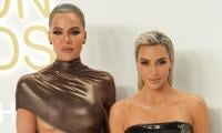 Khloe Kardashian Playfully Mocks Sister Kim's Glamorous Outfit 