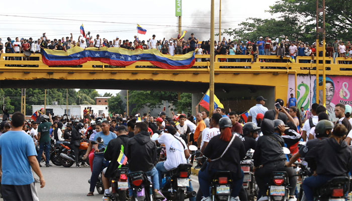 Demonstrators attend a protest against Venezuelan President Nicolas Maduros government in Valencia, Carabobo state, Venezuela on July 29, 2024, a day after the Venezuelan presidential election. — AFP