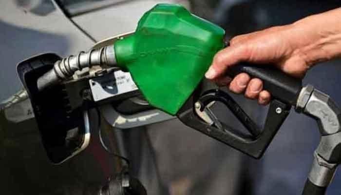 A car being refuelled in this undated picture. — AFP