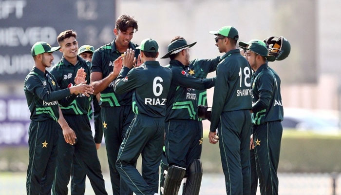 Pakistan Under-19 cricket team celebrating a wicket during a match. — PCB/File