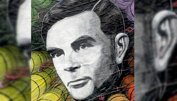 A close-up view shows part of an artwork of Alan Turing. — Reuters/file