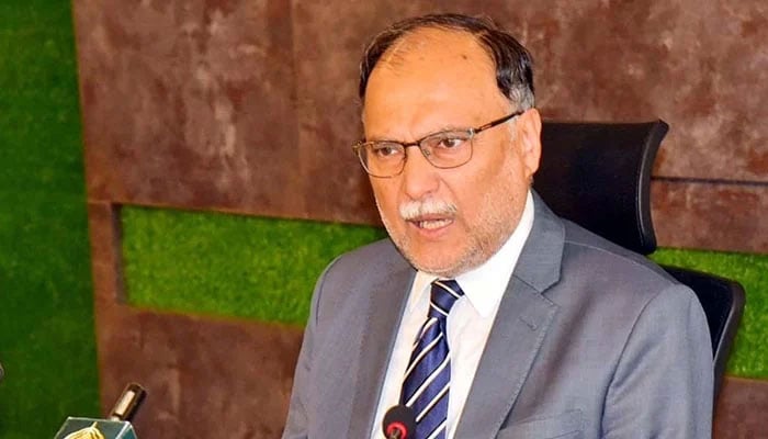 ederal Minister for Planning and Development Professor Ahsan Iqbal addresses a press conference in Islamabad. — PPI/File