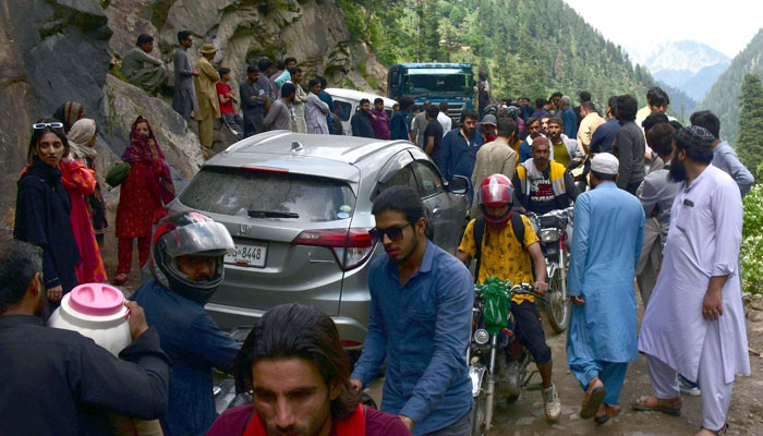 A large numbers of vehicles stuck in traffic jam due to closed road after landslide incident at Kel Road Neelum Valley in Azad Kashmir on Wednesday, June 26, 2024. — PPI