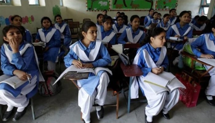 Students listen to their teacher during a lesson at the Islamabad College for girls in Islamabad, Pakistan. — Reuters/File