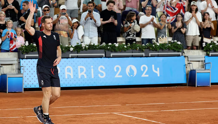 Andy Murray of Britain waves to spectators after losing his match with Daniel Evans of Britain against Taylor Fritz of United States and Tommy Paul of United States at the Paris 2024 Olympics Mens Doubles Quarterfinals at Roland-Garros Stadium, Paris, France on August 01, 2024. — Reuters