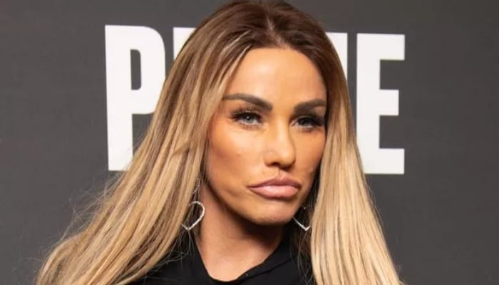 Katie Price jokes about being jailbird as arrest warrant looms