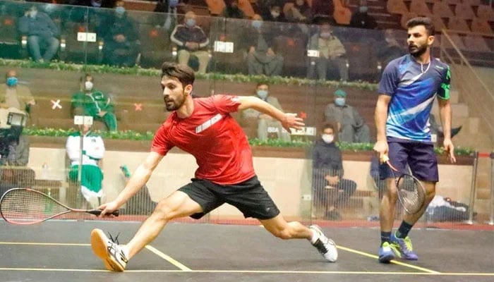 Pakistans rising squash player Nasir Iqbal during a match. — PSF/File