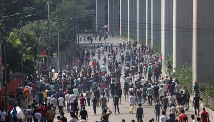 Protesters clash with police and the pro-government supporters, after anti-quota protester demanding the stepping down of the Bangladeshi Prime Minister Sheikh Hasina at the Bangla Motor area, in Dhaka, Bangladesh, on August 4, 2024. —Reuters