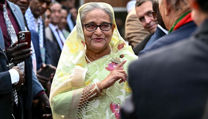 Former Bangladeshs Prime Minister Sheikh Hasina accepts greetings from the assembled media and election observers during a press conference, a day after she won the 12th parliamentary elections, in Dhaka on January 8, 2024. —AFP