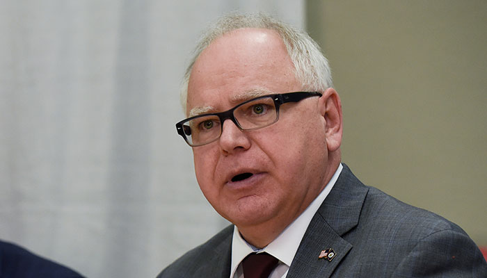 Minnesota Governor Tim Walz speaks during a political gathering. — Reuters/File