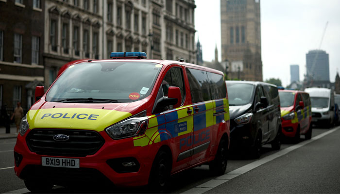 A Metropolitan Police Parliamentary and Diplomatic Protection Group (PADP) van is backdropped by the Elizabeth Tower, commonly known as Big Ben in central London on August 2, 2024. — Reuters