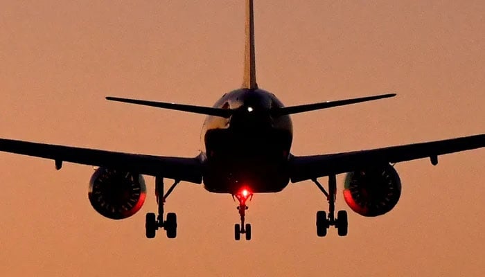 A representational image shows a passenger plane is heading towards its destination. — Reuters/File