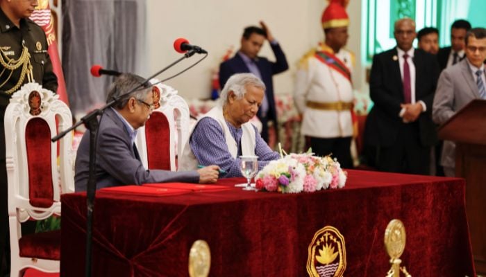 Muhammad Yunus signs the oath book as the countrys head of the interim government at the Bangabhaban, Dhaka, Bangladesh on August 8, 2024. — Reuters