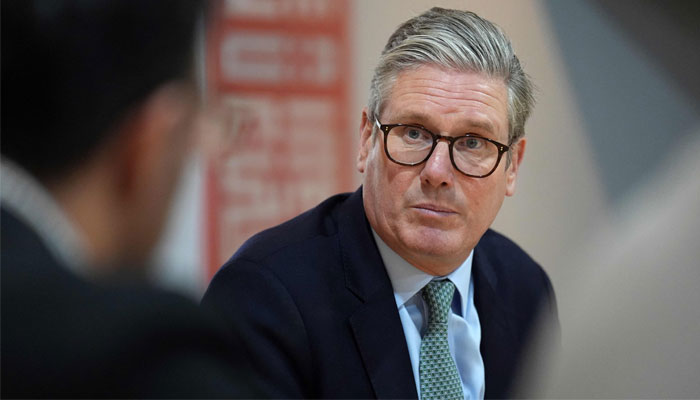 Britains Prime Minister Keir Starmer addresses a meeting during a visit to The Hub - Solihull Mosque in Solihull, West Midlands, on August 8, 2024. — AFP