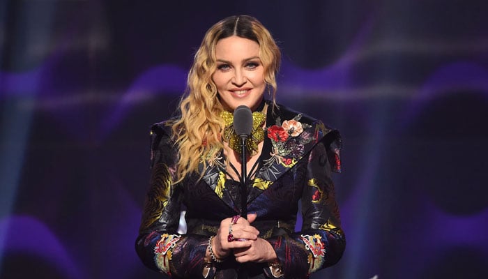 Madonna posts a throwback carousel featuring the 80s