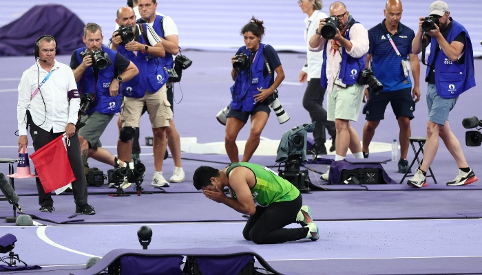 Arshad Nadeem of Pakistan celebrates after winning gold and a new Olympic record on August 8, 2024. —Reuters