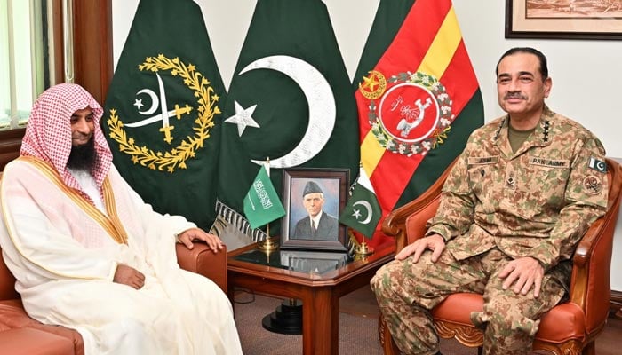 Masjid-e-Nabawis Imam Dr Salah bin Mohammad Al-Budair (left) and Chief of Army Staff (COAS) General Asim Munir. — ISPR