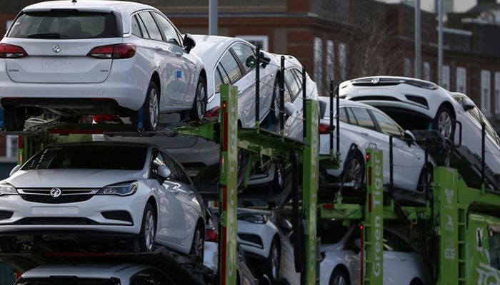 Vauxhall cars are transported on a lorry in Luton, Britain March 6, 2017. — Reuters/File