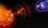 Earth Surrounded By Solar Storm Risking Satellites, Power Grids