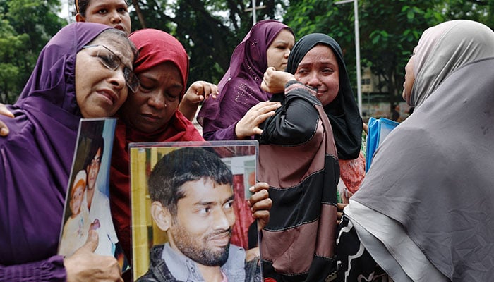 Relatives of the people who disappeared during the reign of Awami League, mourn as they demand justice at the Shaheed Minar, in Dhaka, Bangladesh on August 11, 2024. — Reuters