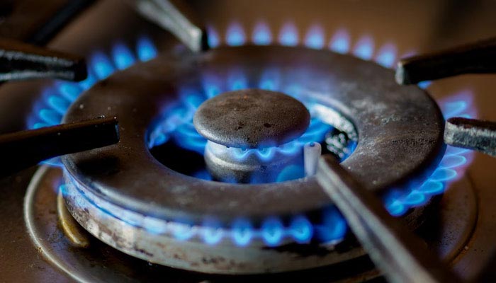 This representational image shows flame burning on the stove. — Unsplash