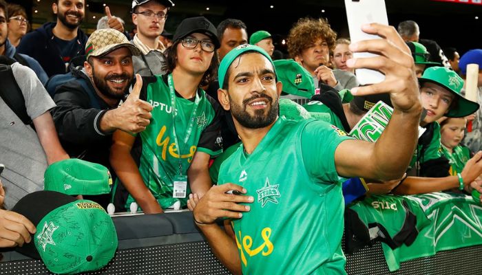 Pakistans pacer Haris Rauf taking photographs with fans after the Melbourne Stars vs Sydney Sixers in the Big Bash League (BBL) in Melbourne, Australia on January 12, 2020. — Cricket Australia (CA)