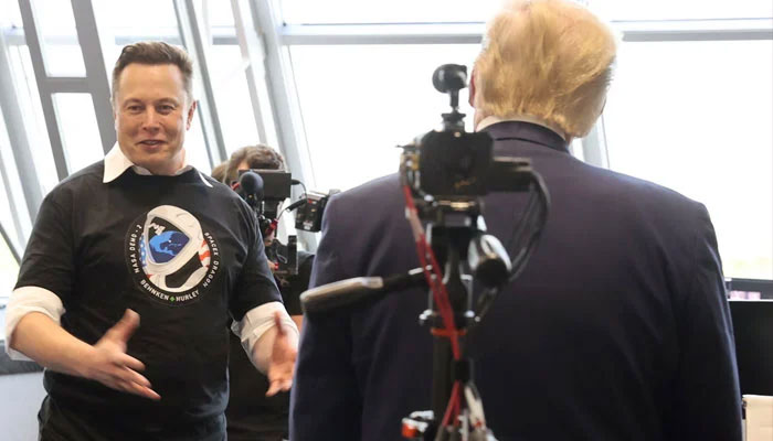 Former US president Donald Trump (right) and Elon Musk are seen at the Firing Room Four after the launch of a SpaceX Falcon 9 rocket and Crew Dragon spacecraft on NASAs SpaceX Demo-2 mission to the International Space Station from NASAs Kennedy Space Center in Cape Canaveral, Florida, US May 30, 2020. — Reuters