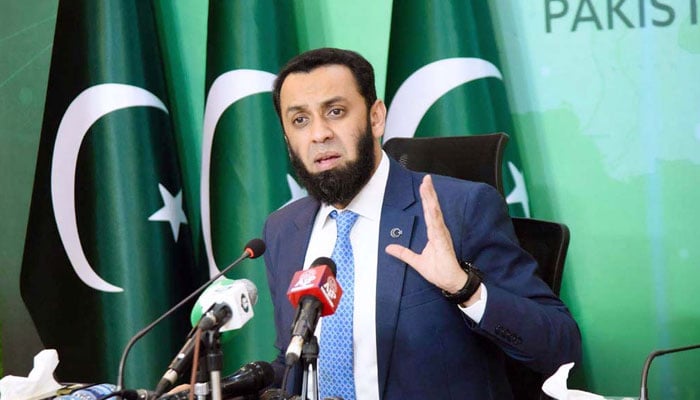 Federal Minister for Information and Broadcasting Attaullah Tarar gestures while addressing a press conference in Islamabad on May 8, 2024. — APP