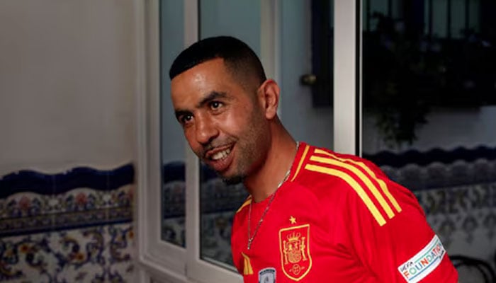 Mounir Nasraoui, father of soccer player Lamine Yamal, smiles in Bar El Cordobes at Rocafonda neighbourhood in Mataro, north of Barcelona, Spain, July 11, 2024. — Reuters