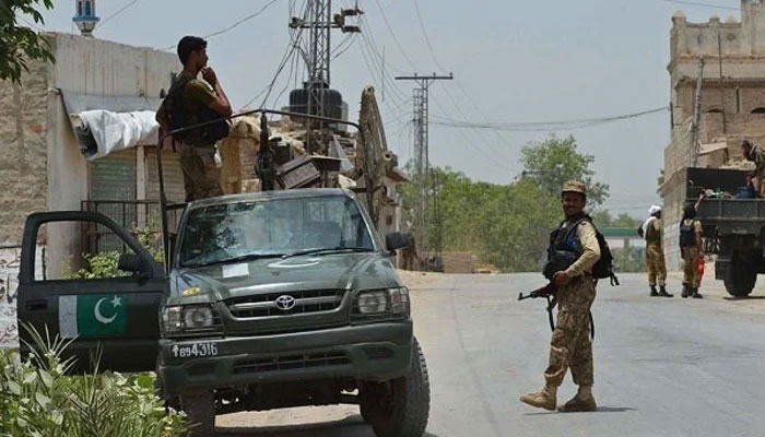 Pakistan Army personnel seen patrolling in an area on a van. — AFP/File