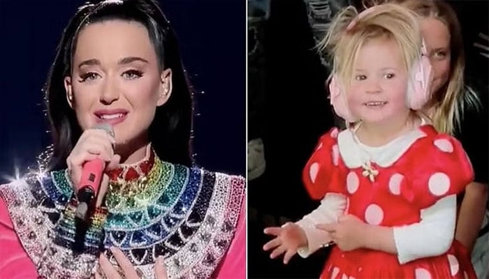 Katy Perry and 3 year old Daisy Dove sign autographs in new clip.