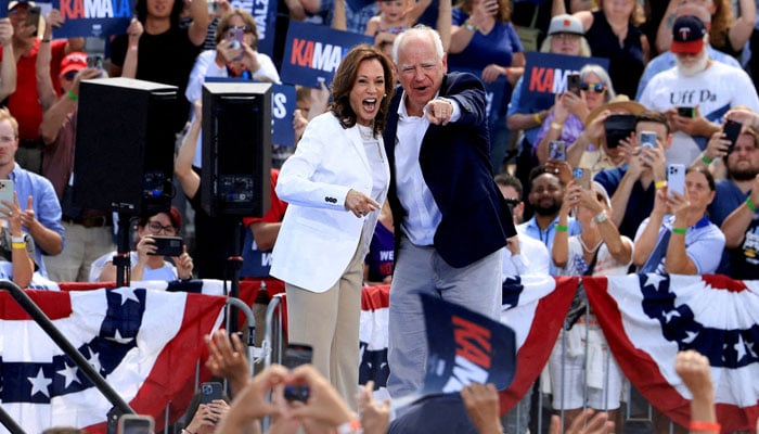 US Vice-President and Democratic presidential candidate Kamala Harris and her running mate Minnesota Governor Tim Walz attend a campaign event in Eau Claire, Wisconsin, US, August 7, 2024. — Reuters