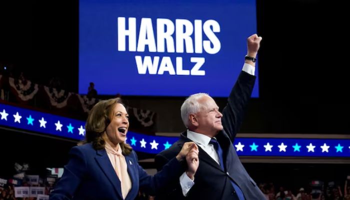 US Vice President and Democratic presidential candidate Kamala Harris (L) and vice presidential running mate Minnesota Governor Tim Walz react as they hold a campaign rally in Philadelphia, Pennsylvania, US on August 6, 2024. — Reuters