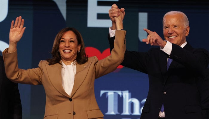 US President Joe Biden gestures with Democratic presidential candidate and US Vice President Kamala Harris during Day one of the Democratic National Convention (DNC) in Chicago, Illinois, US, August 19, 2024. — Reuters