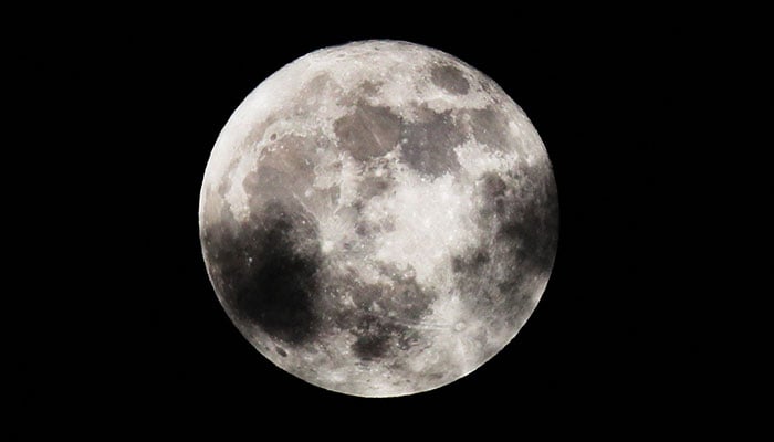 A supermoon rises next to the Santuario de la Virgen de los Remedios church (not pictured) in San Pedro Cholula, Puebla, Mexico, August 19, 2024. — Reuters